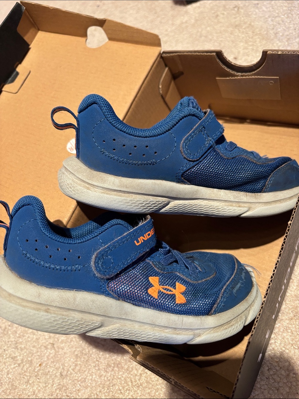 Under Armour Kids Blue Sneakers with Orange Logo